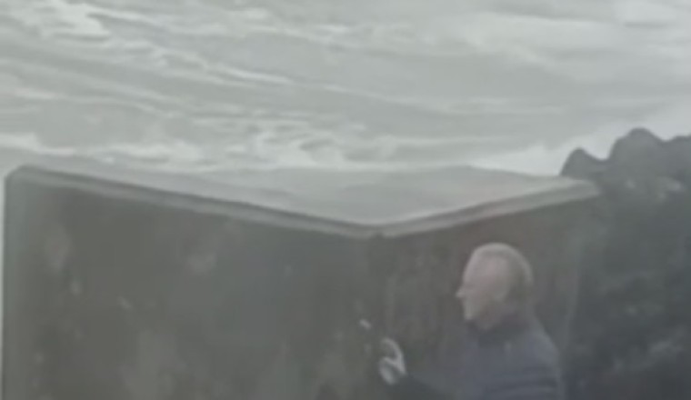 Watch This Hilarious Splashdown: Man vs. Water Dam Overflow!